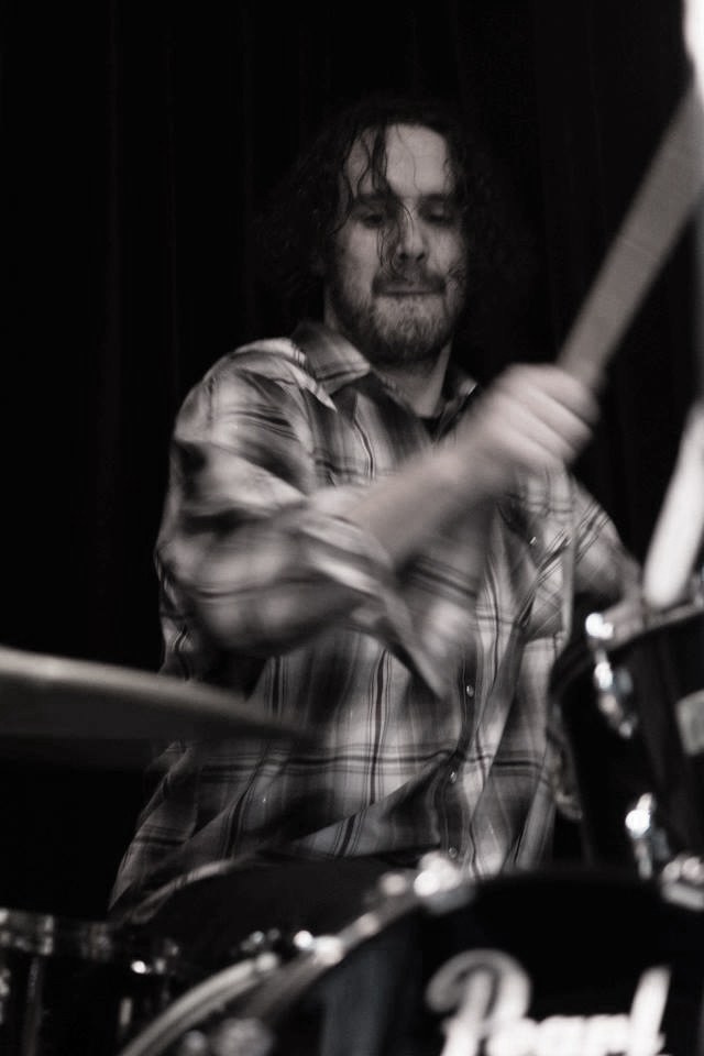 Justin DeLeon playing drums