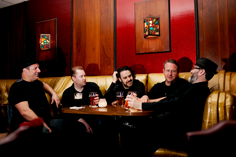 Swallows sitting around a table at Nye's