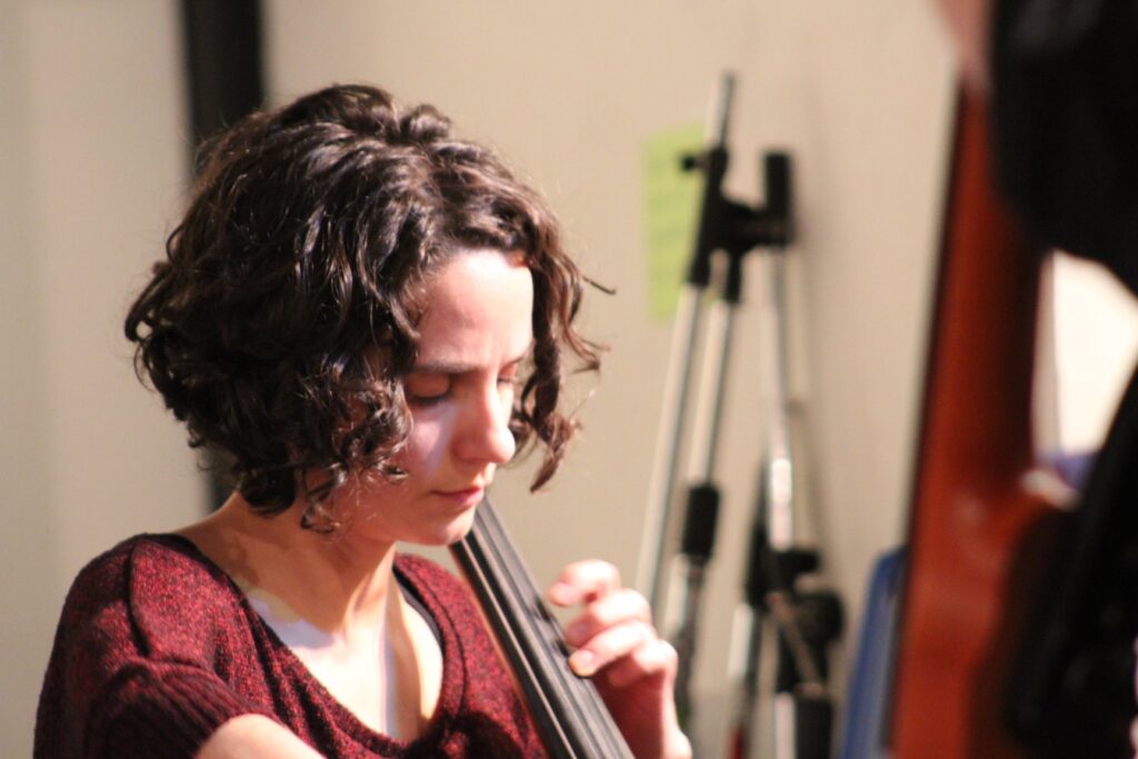 Toni Tinetti profile playing cello